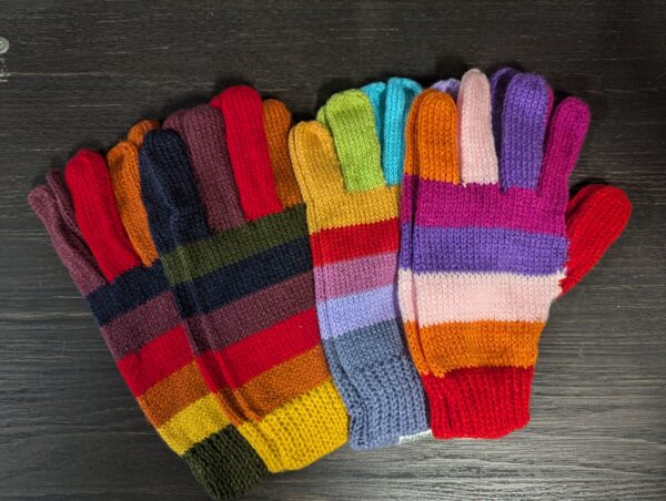 A close up of several pairs of gloves