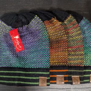 A close up of some hats with tags on them